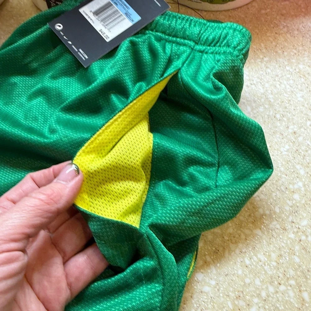 NIKE Dri-fit Oregon Ducks Men’s Sz M Green Athletic Basketball Shorts Yellow O